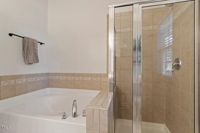 4533 Pale Moss Dr, Raleigh, NC 27606 - bathroom featuring a garden tub and a stall shower