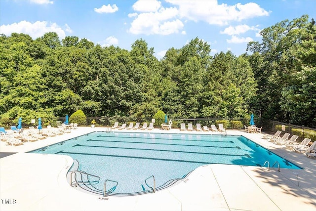 4533 Pale Moss Dr, Raleigh, NC 27606 - community pool featuring a patio area
