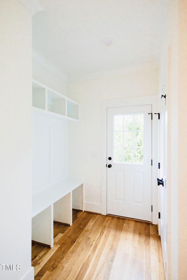415 E Lavender Ave, Durham, NC 27704 - mudroom with wood finished floors and ornamental molding
