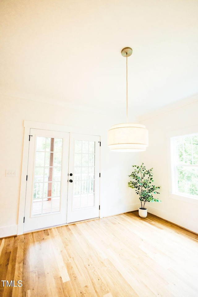 415 E Lavender Ave, Durham, NC 27704 - foyer featuring wood finished floors and ornamental molding