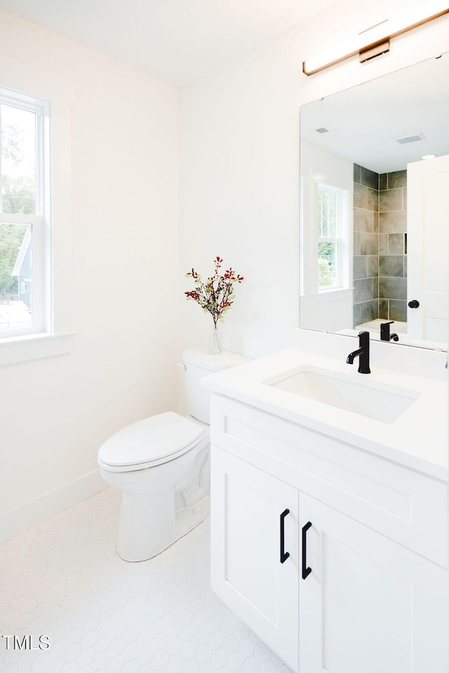 415 E Lavender Ave, Durham, NC 27704 - bathroom with vanity and healthy amount of natural light