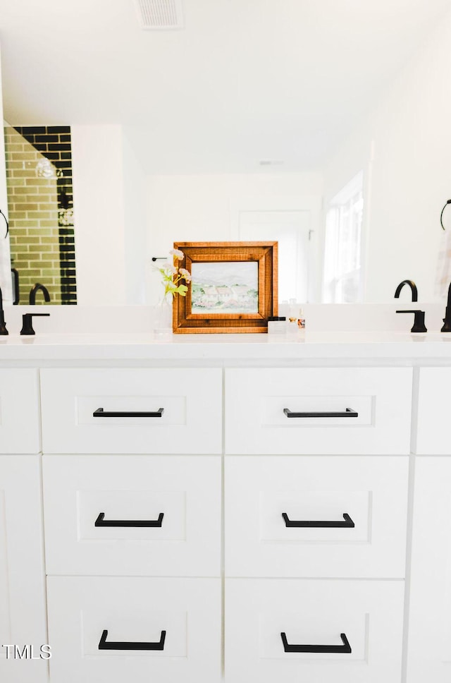 415 E Lavender Ave, Durham, NC 27704 - bathroom with double vanity