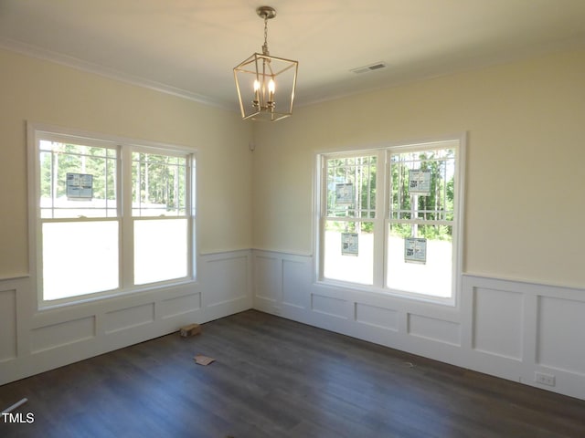776 Shadetree Rd, Benson, NC 27504 - empty room featuring wainscoting, a chandelier, a decorative wall, ornamental molding, and dark wood-style flooring
