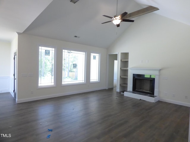 776 Shadetree Rd, Benson, NC 27504 - unfurnished living room featuring high vaulted ceiling, built in shelves, a fireplace with raised hearth, ceiling fan, and dark wood-type flooring