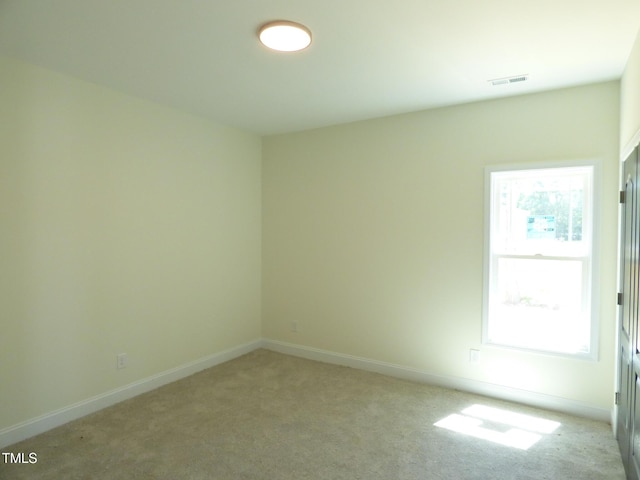 776 Shadetree Rd, Benson, NC 27504 - unfurnished room featuring plenty of natural light and light carpet