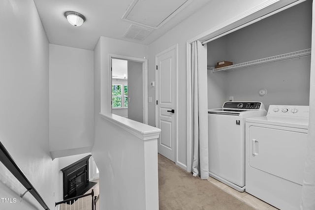 4536 Sugarbend Way, Raleigh, NC 27606 - washroom with washing machine and clothes dryer, attic access, and light carpet