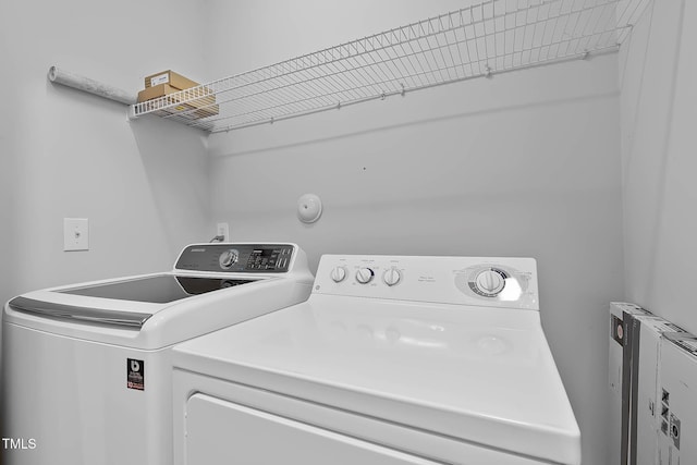 4536 Sugarbend Way, Raleigh, NC 27606 - laundry area with washing machine and clothes dryer