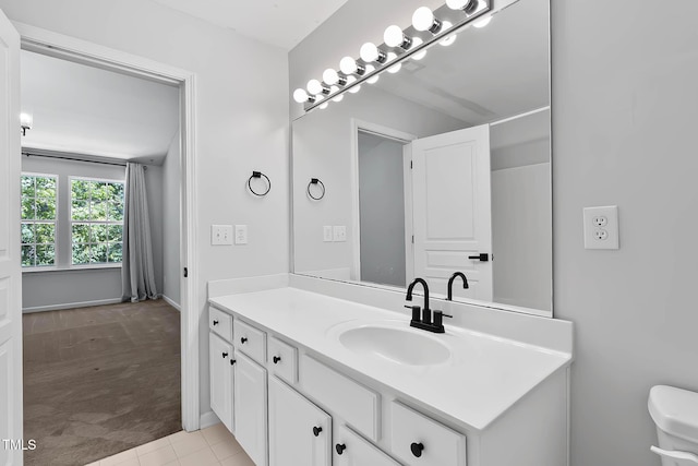 4536 Sugarbend Way, Raleigh, NC 27606 - bathroom with vanity and tile patterned flooring