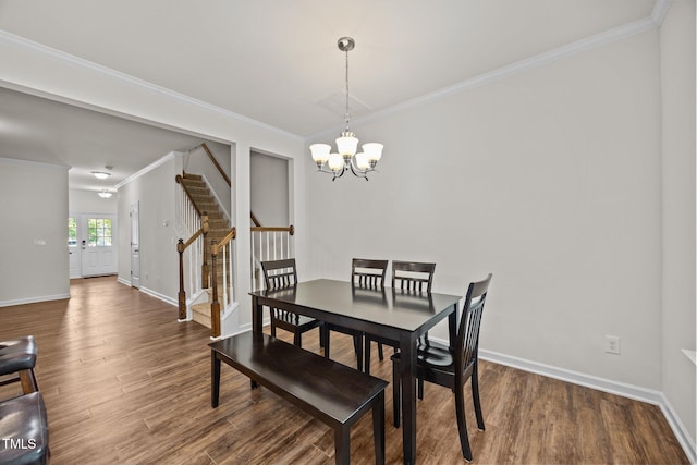 3810 Prince Noah Loop, Wake Forest, NC 27587 - dining space with stairs, crown molding, a chandelier, and wood finished floors