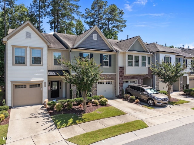 3810 Prince Noah Loop, Wake Forest, NC 27587 - view of property with driveway, a garage, roof with shingles, and stone siding