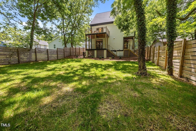 1317 Fay St, Durham, NC 27701 - fenced backyard with a balcony