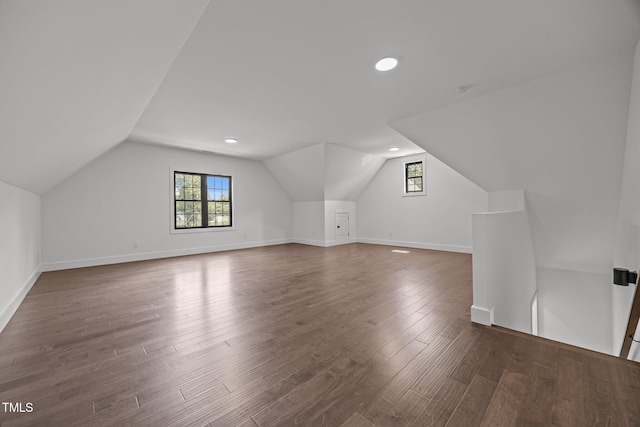 1317 Fay St, Durham, NC 27701 - additional living space featuring lofted ceiling, plenty of natural light, wood finished floors, and recessed lighting