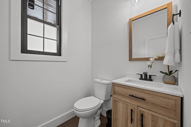 1317 Fay St, Durham, NC 27701 - half bathroom with vanity and wood finished floors