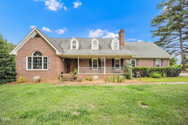 100 Martindale Dr, Youngsville, NC 27596 - view of front of home with brick siding, a porch, a chimney, a front lawn, and crawl space