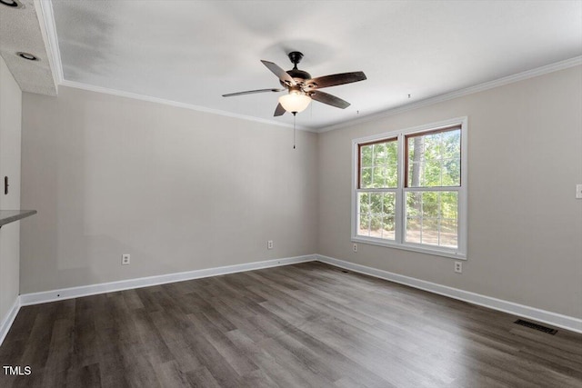 136 Dixie Ln, Youngsville, NC 27596 - empty room with ceiling fan, dark wood-type flooring, and ornamental molding