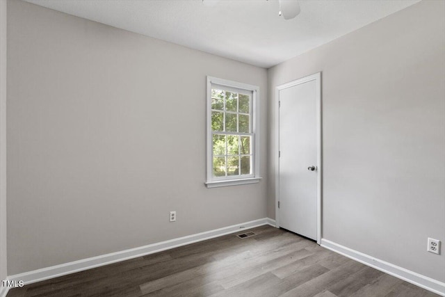 136 Dixie Ln, Youngsville, NC 27596 - empty room featuring wood finished floors and ceiling fan