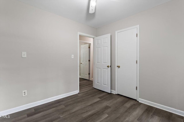 136 Dixie Ln, Youngsville, NC 27596 - unfurnished bedroom with wood finished floors and a ceiling fan