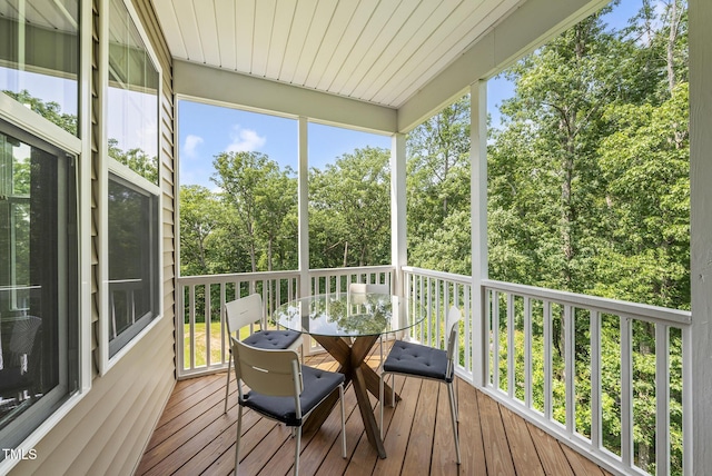 610 Chronicle Dr, Cary, NC 27513 - sunroom / solarium with outdoor dining area and view of scattered trees