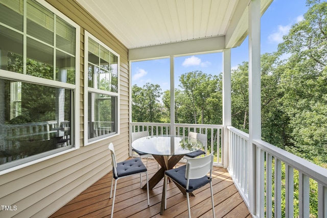 610 Chronicle Dr, Cary, NC 27513 - deck featuring outdoor dining space and view of wooded area