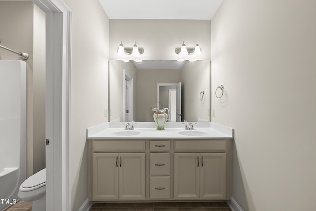 610 Chronicle Dr, Cary, NC 27513 - bathroom featuring double vanity and tile patterned flooring
