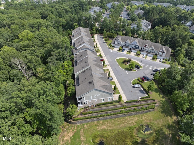 610 Chronicle Dr, Cary, NC 27513 - aerial view of residential area featuring a heavily wooded area