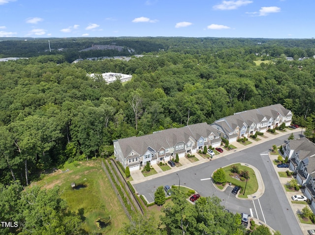 610 Chronicle Dr, Cary, NC 27513 - aerial overview of property's location featuring a heavily wooded area and nearby suburban area