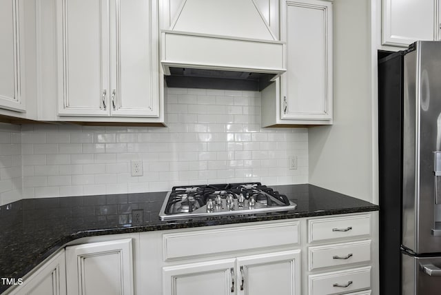 610 Chronicle Dr, Cary, NC 27513 - kitchen featuring appliances with stainless steel finishes, premium range hood, and white cabinetry