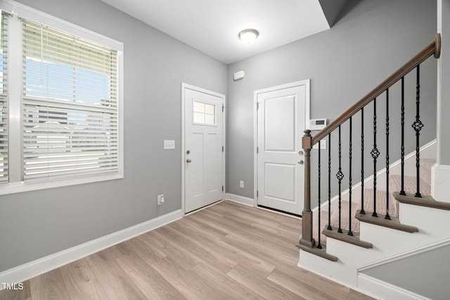 147 Sunfish St, Smithfield, NC 27577 - foyer entrance featuring wood finished floors and stairs