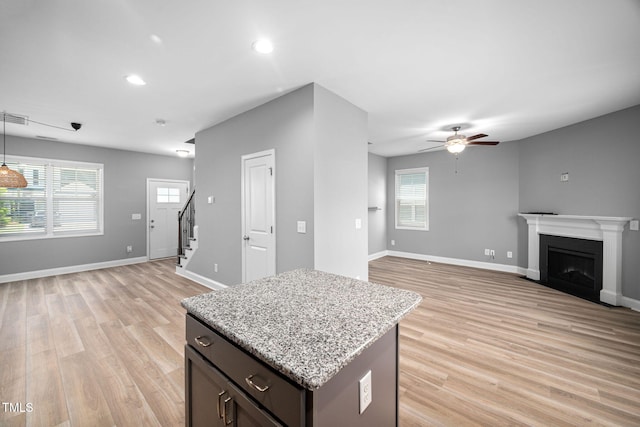 147 Sunfish St, Smithfield, NC 27577 - kitchen with open floor plan, a ceiling fan, light wood-style floors, and recessed lighting