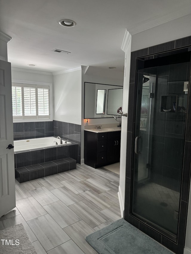 6225 Acorn Ridge Trl, Hillsborough, NC 27278 - bathroom featuring crown molding, vanity, a bath, and a shower stall