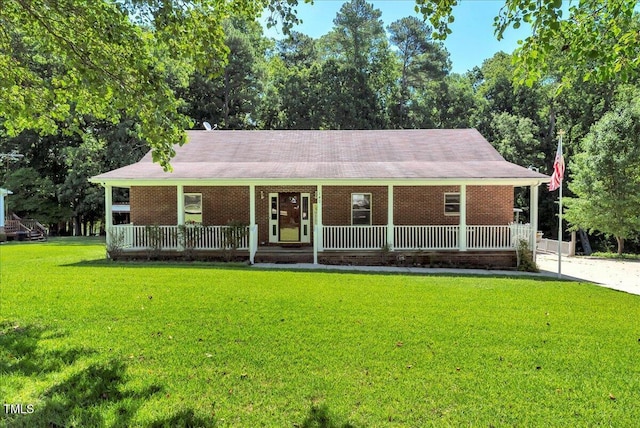 140 Maryland Dr, Manson, NC 27553 - view of front facade featuring a porch, a front yard, and brick siding
