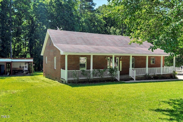 140 Maryland Dr, Manson, NC 27553 - view of front of house with crawl space, a porch, a front yard, and brick siding