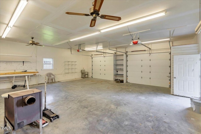 140 Maryland Dr, Manson, NC 27553 - garage featuring a garage door opener and a ceiling fan