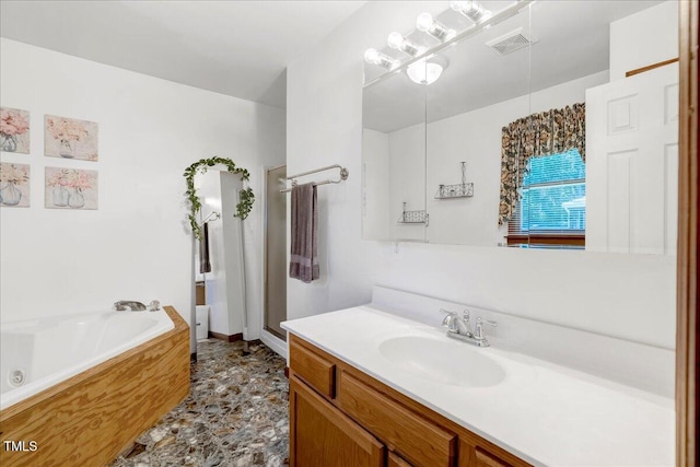 140 Maryland Dr, Manson, NC 27553 - full bath featuring vanity and a jetted tub