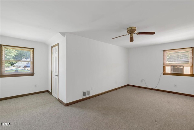 140 Maryland Dr, Manson, NC 27553 - spare room featuring plenty of natural light, light carpet, and a ceiling fan