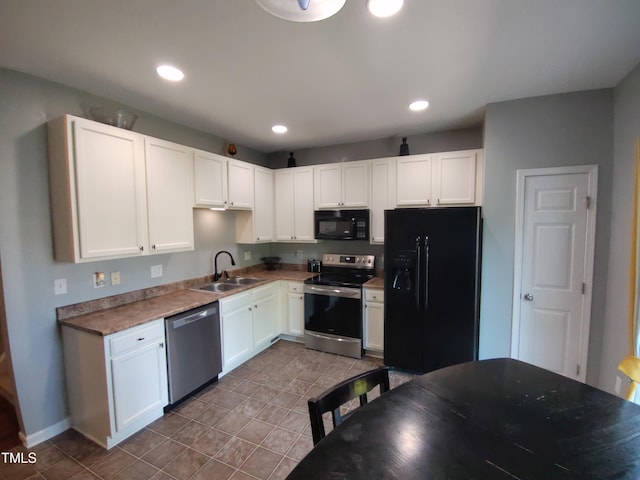 650 Ganyard Farm Way Unit 32, Durham, NC 27703 - kitchen featuring black appliances, white cabinets, tile patterned flooring, and recessed lighting