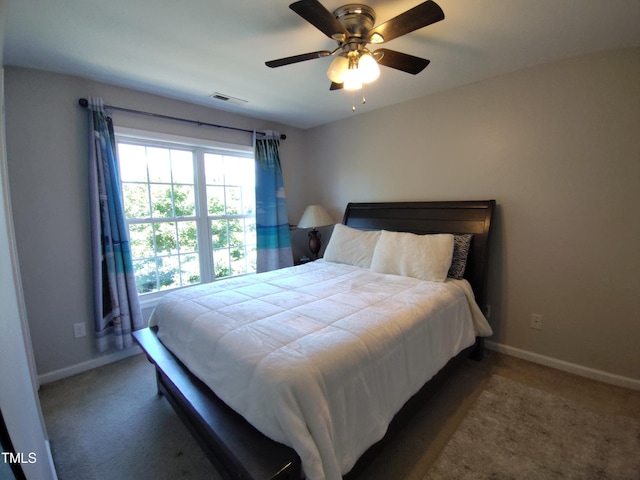 650 Ganyard Farm Way Unit 32, Durham, NC 27703 - carpeted bedroom with baseboards and ceiling fan