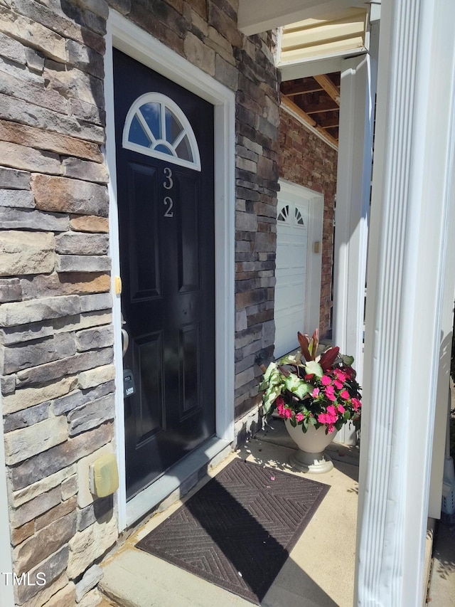 650 Ganyard Farm Way Unit 32, Durham, NC 27703 - doorway to property with stone siding