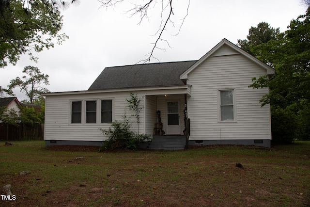 22485 NC-125, Williamston, NC 27892 - view of front of house with crawl space, a front yard, and a shingled roof