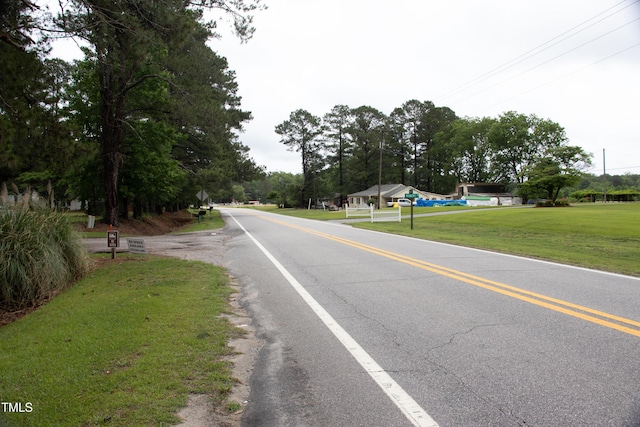 22485 NC-125, Williamston, NC 27892 - view of asphalt street featuring view of scattered trees