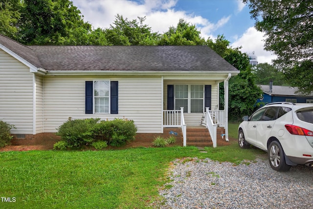 308 E Gilbreath St, Graham, NC 27253 - single story home with a porch, a front lawn, a shingled roof, and crawl space