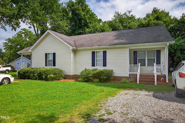 308 E Gilbreath St, Graham, NC 27253 - ranch-style home with a porch, a front yard, crawl space, and a shingled roof