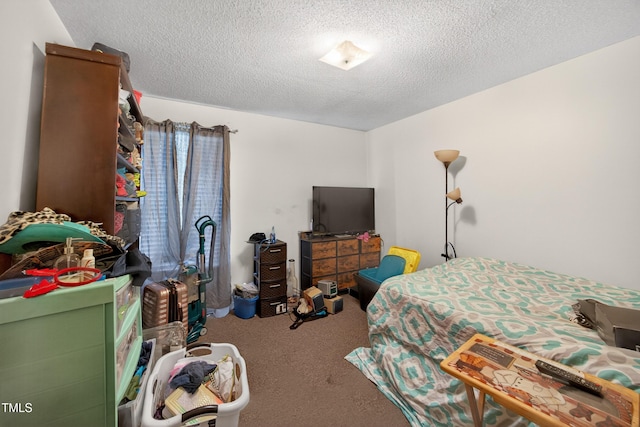 308 E Gilbreath St, Graham, NC 27253 - carpeted bedroom featuring a textured ceiling