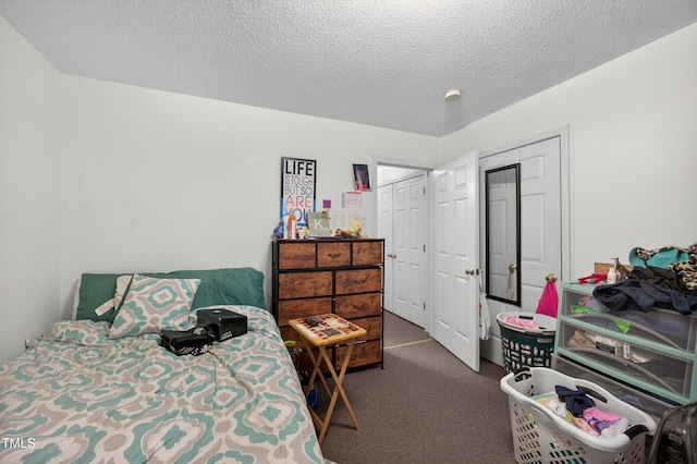 308 E Gilbreath St, Graham, NC 27253 - carpeted bedroom featuring a textured ceiling