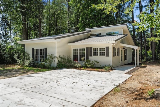 12741 Birchwood Cir, Laurinburg, NC 28352 - back of property with a metal roof