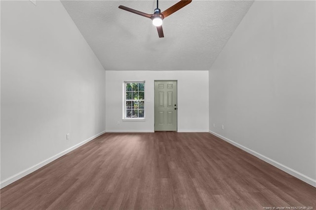 12741 Birchwood Cir, Laurinburg, NC 28352 - unfurnished room featuring a textured ceiling, wood finished floors, vaulted ceiling, and ceiling fan