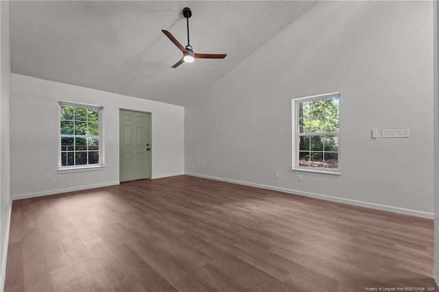 12741 Birchwood Cir, Laurinburg, NC 28352 - unfurnished living room with a ceiling fan, high vaulted ceiling, wood finished floors, and a textured ceiling
