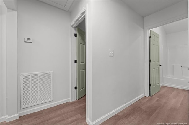 12741 Birchwood Cir, Laurinburg, NC 28352 - corridor with wood finished floors and baseboards