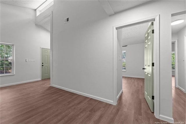 12741 Birchwood Cir, Laurinburg, NC 28352 - hall with wood finished floors and a textured ceiling