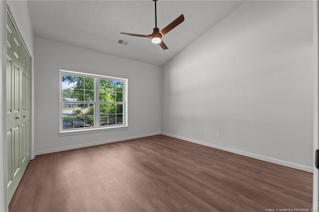 12741 Birchwood Cir, Laurinburg, NC 28352 - unfurnished bedroom featuring wood finished floors, a closet, a ceiling fan, and high vaulted ceiling